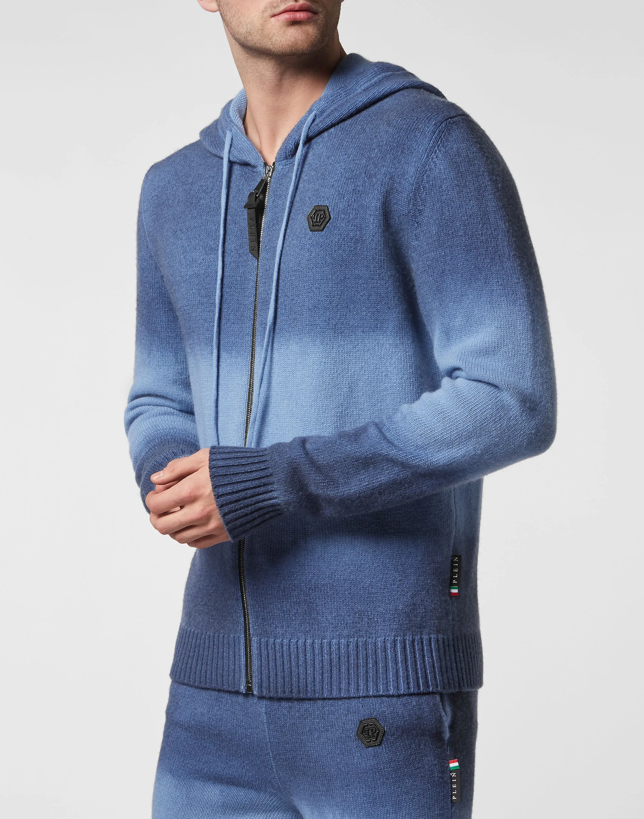 Cash Wool Jogging Strickanzug: Jacke/Hose mit Python-Einsatz und Totenkopf-Motiv